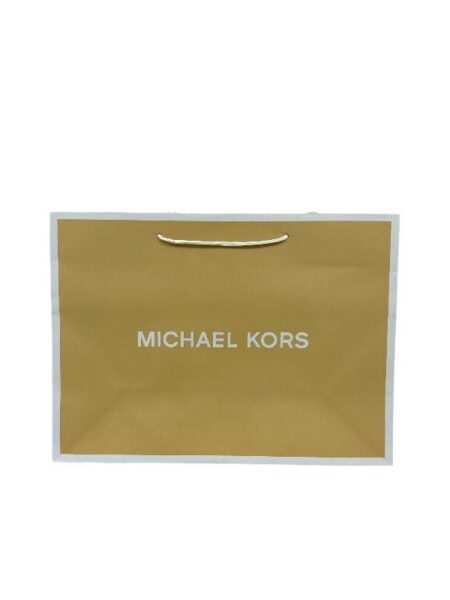 Authentic Michael Kors medium paper bag with logo, perfect for packaging luxury handbags or shoes purchased in Bahrain.