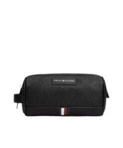 Durable pebble-textured Tommy Hilfiger men's washbag with signature stripe branding and zip closure, available in Bahrain.
