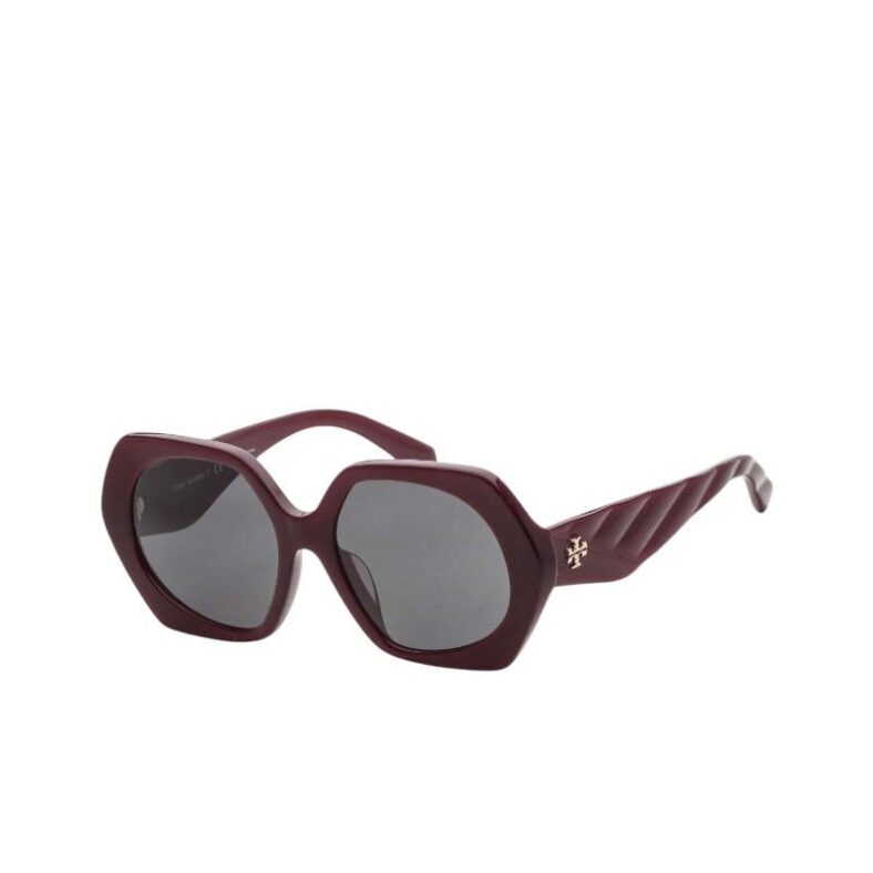Close-up of Tory Burch Irregular Women's Sunglasses in Bordeaux Acetate frame with Dark Grey lenses, available in Bahrain.