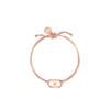 An elegant Tory Burch Embrace Ambition Bracelet in Rose Gold featuring a nylon cord and Gemini Link charm for women.