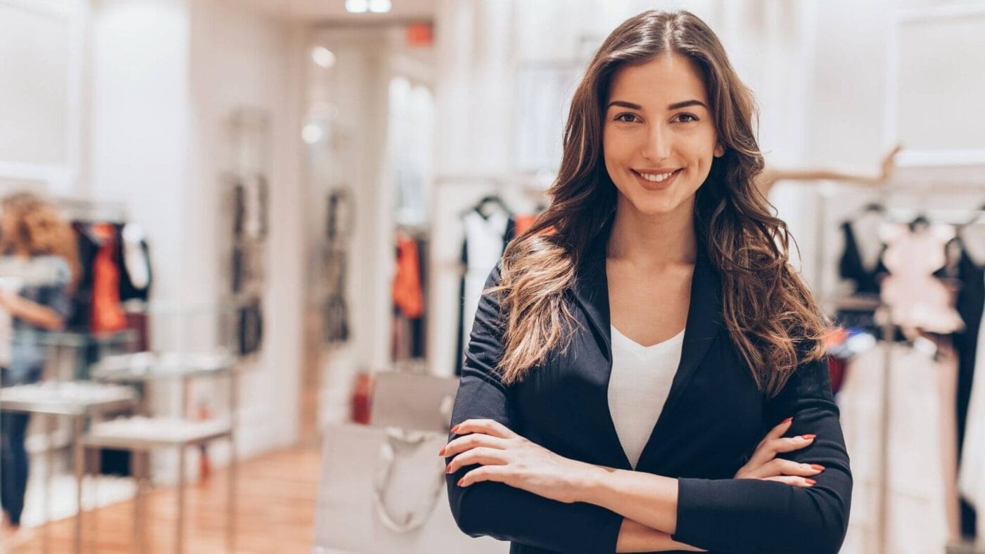 Luxury Brands Bahrain - Woman shopping for authentic designer handbags and fashion at AH Brands