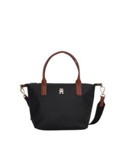 Versatile black nylon Tommy Hilfiger tote bag featuring TH monogram hardware and a removable webbing crossbody strap, perfect for stylish women in Bahrain.