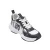 Close-up view of DKNY Deyoung chunky sneaker (White, Gray, Black) showing 1.78-inch heel and metallic accents. Cushioned street shoe for all genders.
