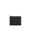 Close-up of Charles & Keith Duo Quilted Small Wallet in black Nappa PU, featuring snap closure and diamond quilting. Perfect accessory for Bahraini women.