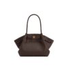 Elegant dark brown JW PEI Hana medium tote bag with gold hardware, shown carried over the shoulder by a woman in Bahrain.